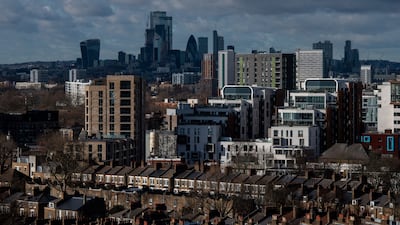 Skyscrapers in the City of London's square mile financial district on the skyline beyond residential property in London. Britain's annual rate of growth remained steady in at 9.7 per cent, with the average home hitting a record high of £276,759 at the start of 2022. Bloomberg