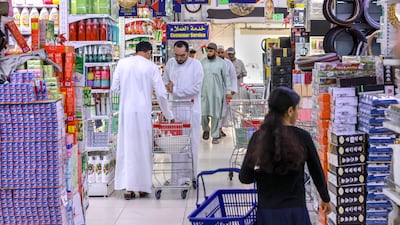 Shoppers in the Mina Port area of Abu Dhabi. Victor Besa / The National