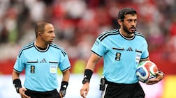 Referee Omar Al Ali, right, took charge of his first match of the 2026 World Cup in the match between New Zealand and Egypt. AFP