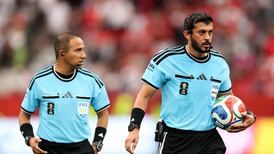 Referee Omar Al Ali, right, took charge of his first match of the 2026 World Cup in the match between New Zealand and Egypt. AFP