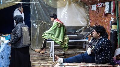 As one of the only surgeons in Tahrir Square, Dr Al Abdi is in demand and he refuses to turn any patients away. Luke Pierce for The National