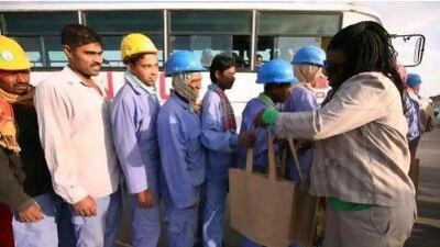 Volunteers surprised laborers by distributing meal packages at building sites. From Feb 14 to 18, one can purchase a Valentine's Care Package for laborers for Dh14 on the Living Social site.