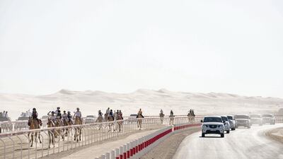 Sheikh Mohamed bin Zayed attends a camel race in Remah. Ministry of Presidential Affairs