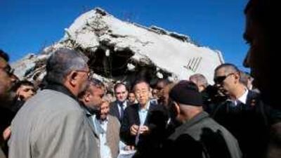 The UN secretary general, Ban Ki-moon, centre, visits Palestinian houses destroyed during Israel's three-week offensive last year.