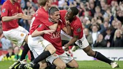 Federico Macheda, second right, is mobbed by United teammates after his dramatic winner last year.