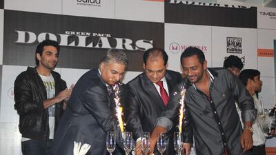 Producers Ashwani Sahdev and Vinod Adnani celebrate at the Dollars casting announcement