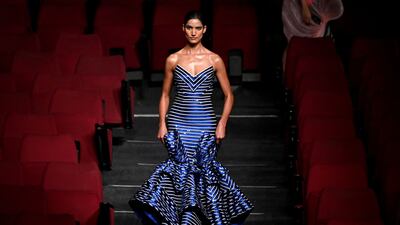 A model presents a blue number by Amit Aggarwal.