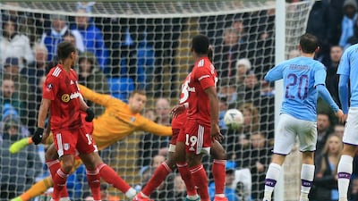 Manchester City's Bernardo Silva scores their second goal. AFP