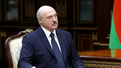 Belarusian President Alexander Lukashenko listens to the head of the Investigative Committee Ivan Naskevich during their meeting in Minsk, Belarus. (Nikolai Petrov, BelTA via AP)