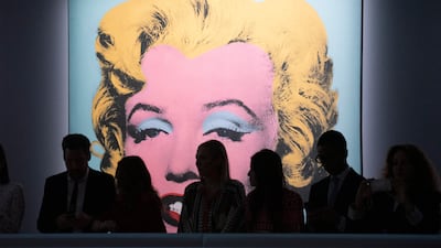 Staff who will be handling bids over the phone take their places before The Evening Sale of works from The Collection of Thomas and Doris Amman at Christie's Auction House in New York, New York, USA, 09 May 2022. EPA / SARAH YENESEL