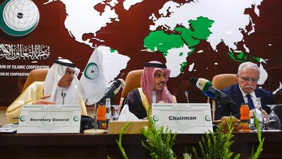 Palestinian Foreign Minster Riyad Al Maliki (right) delivers a speech during an emergency ministerial meeting of the Organisation of Islamic Cooperation (OIC) in Jeddah. AFP