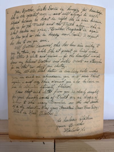 A letter written by Malcom X from prison, which first confirmed his adoption of the Islamic faith, is on display. Razmig Bedirian for The National