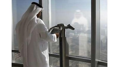 Dubai's lofty ambitions such as the Burj Khalifa, the world's tallest building, have cast a long shadow.