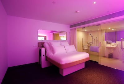 A YotelAir hotel room with a raised wheelchair-accessible bed at Jewel Changi Airport. Reuters