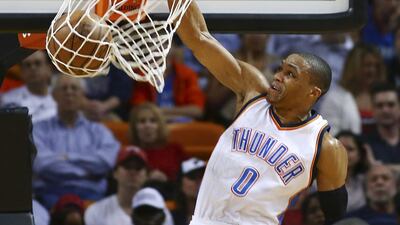 Oklahoma City's Russell Westbrook dunks against the Miami Heat during the first half of Thunder's win. J Pat Carter/AFP