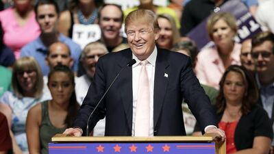 Republican presidential candidate Donald Trump speaks at a rally and picnic in Oskaloosa, Iowa. Charlie Neibergall / AP Photo