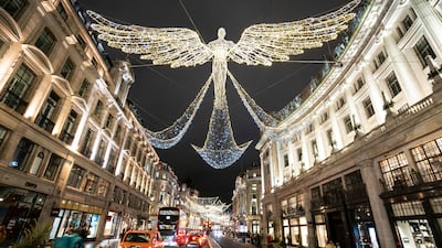Christmas lights shine above Regent Street, central London. All photos: AP