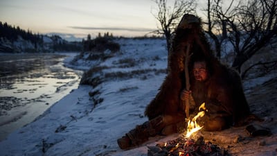 A handout photo of Leonardo DiCaprio as Hugh Glass struggles to stay warm during a vicious winter. in "The Revenant" (Kimberley French / 20th Century Fox)