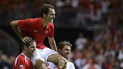 Roger Federer has only the Davis Cup title missing from his resume. Martial Trezzini / AP Photo