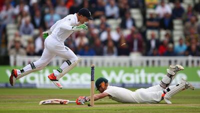 David Warner survives a run out after a direct hit from Stuart Broad. Michael Steele / Getty Images)