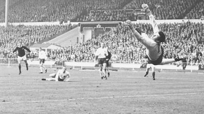 Gordon Banks saves a shot from Denis Law during an England v Scotland match at Wembley in 1967. Getty Images