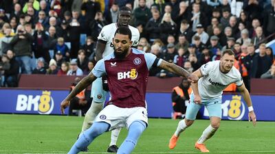 Aston Villa's Douglas Luiz scores his side's second goal from the penalty spot. AP