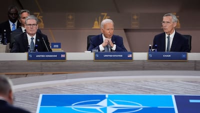 Mr Biden speaks during the opening session of the summit. AP
