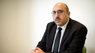 TFounder of the Syrian Observatory for Human Rights, Rami Abdel Rahman operates from the English city of Coventry. Leon Neal / AFP