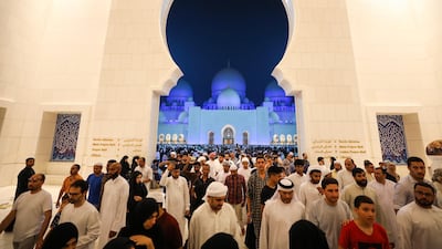 Tens of thousands of worshippers pray at Sheikh Zayed Grand Mosque in Abu Dhabi on Saturday night. Courtesy Sheikh Zayed Grand Mosque