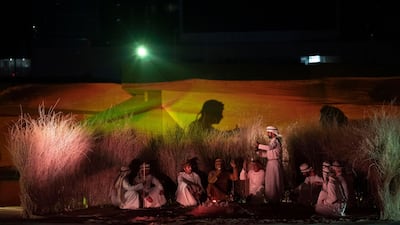 Performers participate in a show during the opening of Qasr Al Hosn.
