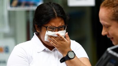 Hasena Mahmood is overcome by emotion after receiving her results at City of London College. Getty Images