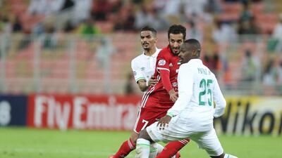 Ali Mabkhout, in red, in action for Al Jazira during the goalless draw against Tractor Sazi in the Asian Champions League on Monday. AFP
