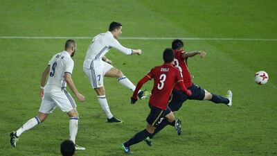 Real Madrid’s Cristiano Ronaldo scores their fourth goal. Issei Kato / Reuters