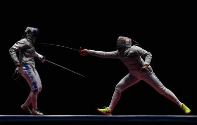 Irene Vecchi of Italy competes against Ibtihaj Muhammad (right) of the United States in the Rio 2016 Olympic Games. Getty