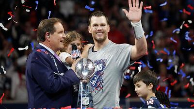 Brady is interviewed with his children post-match. Reuters