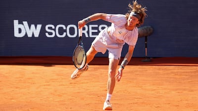 Andrey Rublev in action against Arthur Fils during Sunday's final of the Barcelona Open with the logo of a betting company visible in the background. Getty Images