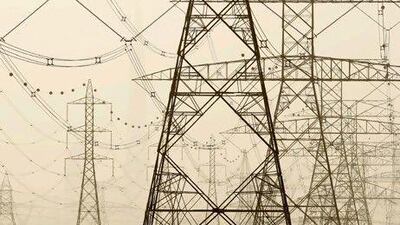 Power lines feed into Dubai. Ryan Carter / The National