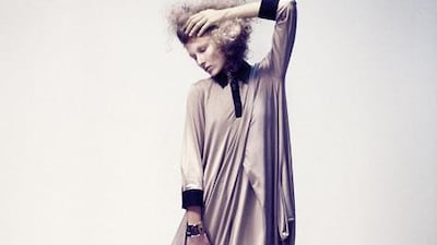 Dress, Dh2,750, Paule Ka at Harvey Nichols. Tights, Dh50, Topshop. Shoes, Dh3,600; cuff, Dh5,300, both Christian Dior.