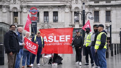 Members of the Aslef union protest outside Victoria Station in London. PA