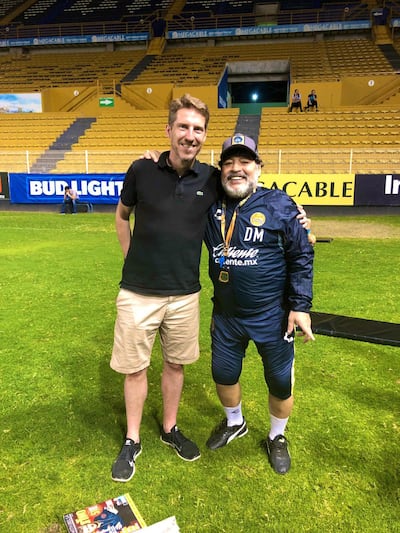 Andy Mitten alongside Argentina legend Diego Maradona. Photo: Andy Mitten for The National