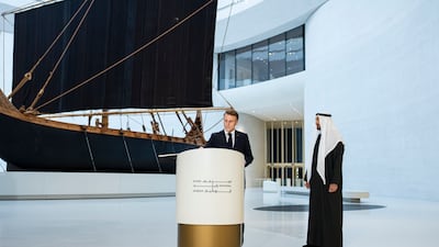 President Sheikh Mohamed watches on as Emmanuel Macron, President of France, signs the guestbook at the Zayed National Museum as part of his working visit to the UAE last week. Photo: UAE Presidential Court