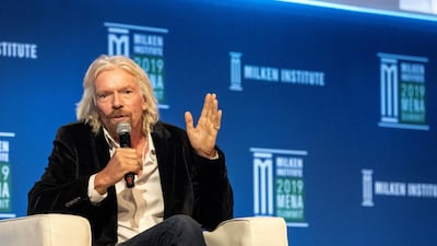 Sir Richard Branson speaks at the Milken Institute’s Mena Summit in Abu Dhabi on Tuesday. Antonie Robertson / The National