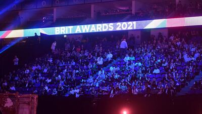 More than 4,000 people attended the Brit Awards in a pilot scheme, which marked the return on live music in the UK. AP