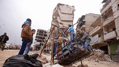 Syrian children play in the government-held part of Aleppo on December 16, 2016. The evacuation of civilians and fighters from the last rebel-held areas uin the city’s east were suspended by the Syrian government a day after they began, leaving thousands of people trapped. Youssef Karwashan / AFP