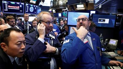 Traders gather on the floor of the New York Stock Exchange (NYSE) in New York. In the first nine months of 2017, global equity markets have outperformed other asset classes. Brendan McDermid / Reuters