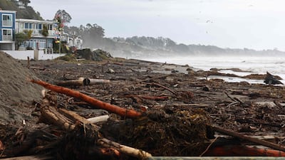 Storm debris near homes along the beach in Aptos. Getty / AFP