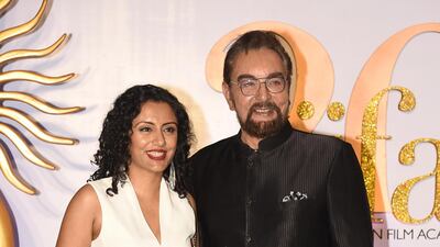 Indian Bollywood actor Kabir Bedi (L) with his wife Parveen Dusanj arrive for the IIFA Rocks of the 20th International Indian Film Academy (IIFA) Awards at NSCI Dome in Mumbai on September 16, 2019