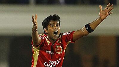 R Vinay Kumar of Bangalore takes a three-wicket haul against Mumbai yesterday.