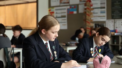 Children attend classes at the Royal Grammar School Guildford Dubai. Chris Whiteoak / The National