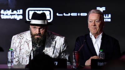 Britain's Tyson Fury arrives for the press conference. AFP